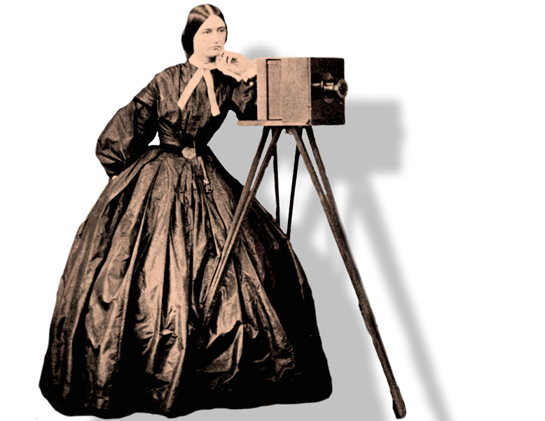 A black and white photo of a woman in bell shaped gown leaning against an old fashioned camera mounted on wooden tripod